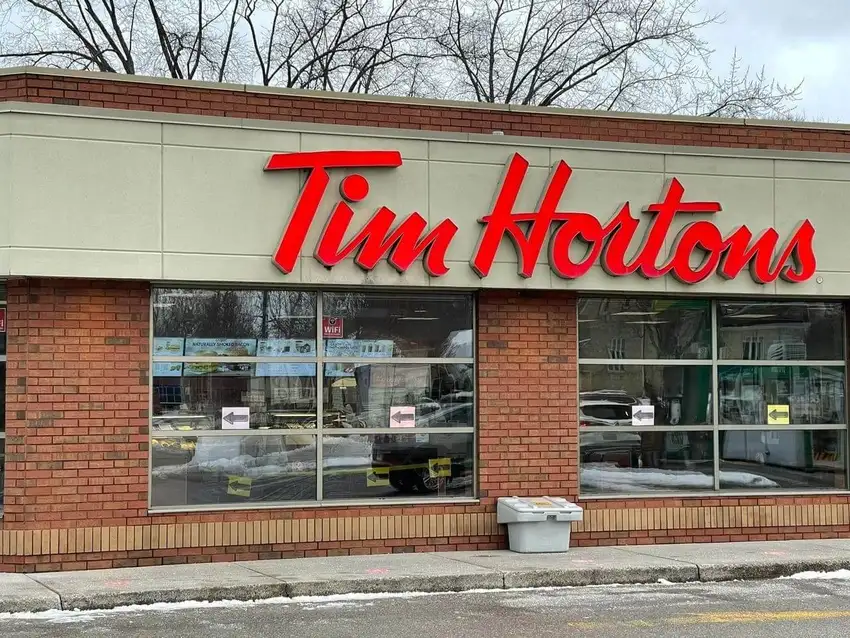 A building that has a sign on the front of it.